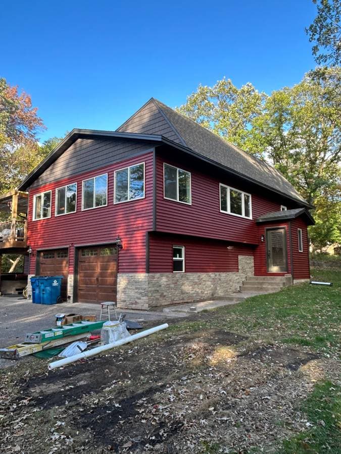 Home with red vinyl siding